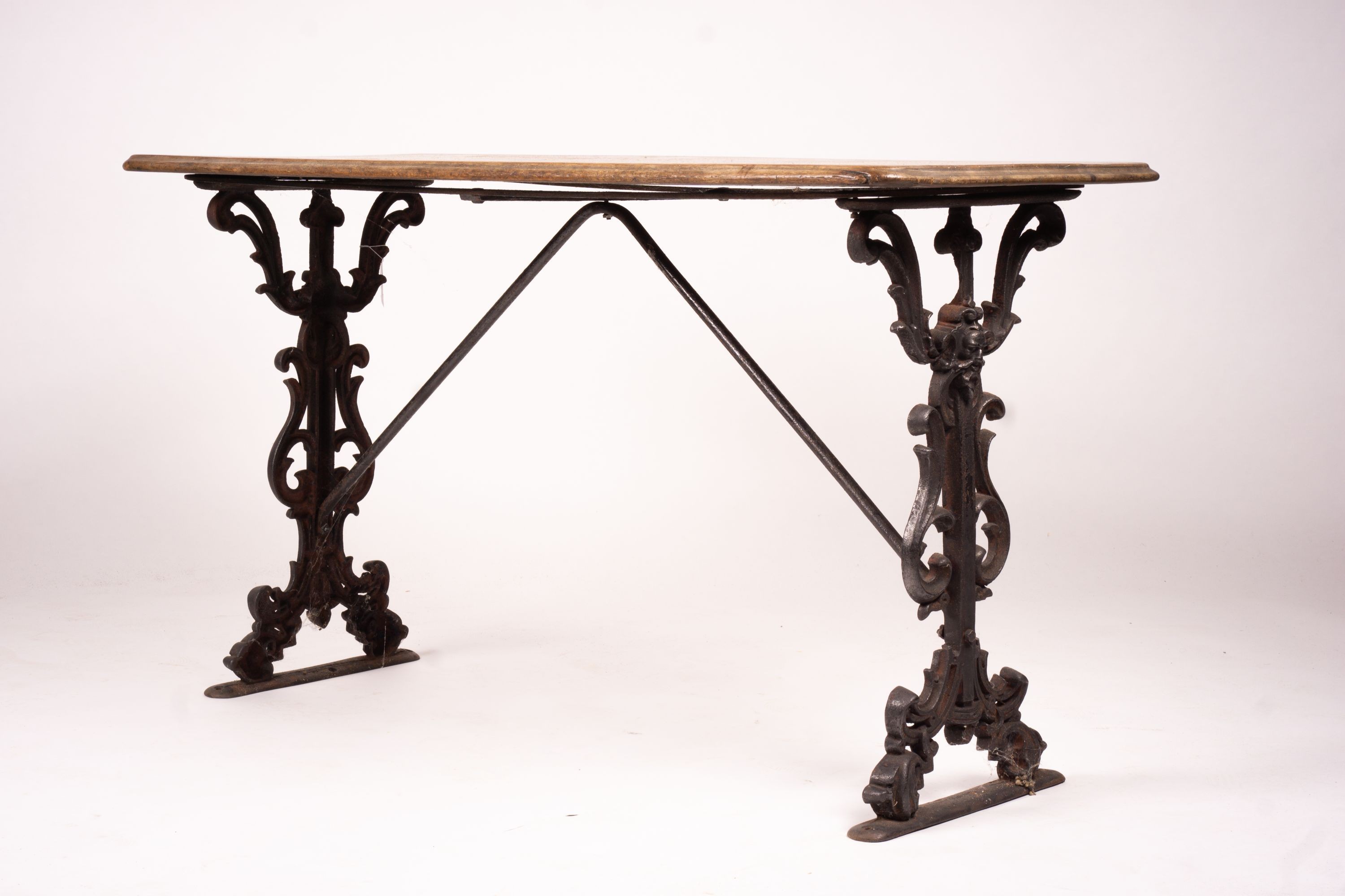 A Victorian style rectangular mahogany and cast iron tavern table, width 120cm, depth 52cm, height 69cm